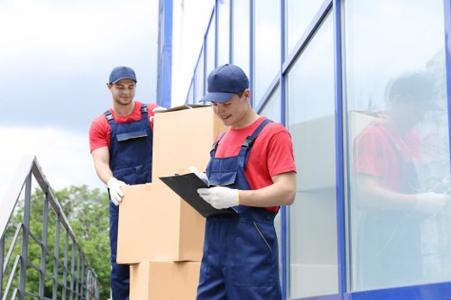 Office relocation planning in Haringey with moving boxes and desks