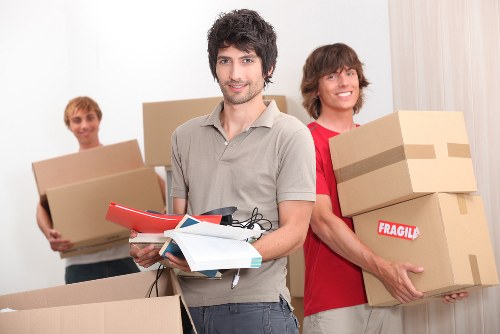 Removal team planning a house move in Haringey street