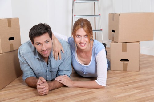 Professional movers packing household items in Haringey
